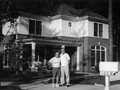 My colleague Larry with me in front of my home in Chapel Hill (2000).